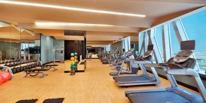 Fitness center at the AlRayyan Hotel Doha, Curio Collection by Hilton.