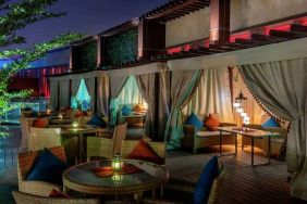 Outdoor patio at the AlRayyan Hotel Doha, Curio Collection by Hilton.