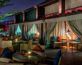Outdoor patio at the AlRayyan Hotel Doha, Curio Collection by Hilton.