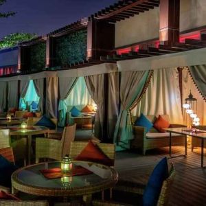 Outdoor patio at the AlRayyan Hotel Doha, Curio Collection by Hilton.