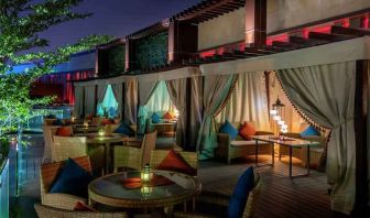 Outdoor patio at the AlRayyan Hotel Doha, Curio Collection by Hilton.