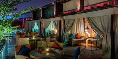 Outdoor patio at the AlRayyan Hotel Doha, Curio Collection by Hilton.