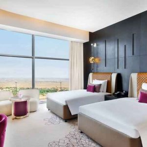 Twin room at the AlRayyan Hotel Doha, Curio Collection by Hilton.