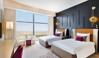 Twin room at the AlRayyan Hotel Doha, Curio Collection by Hilton.