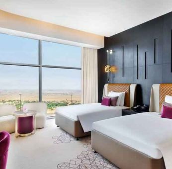 Twin room at the AlRayyan Hotel Doha, Curio Collection by Hilton.