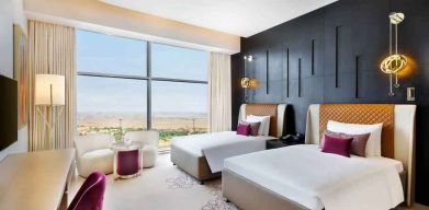 Twin room at the AlRayyan Hotel Doha, Curio Collection by Hilton.