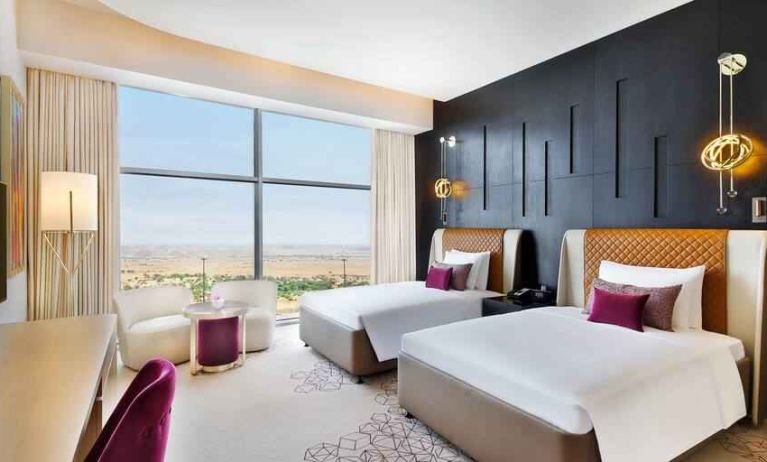 Twin room at the AlRayyan Hotel Doha, Curio Collection by Hilton.