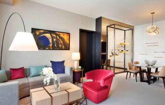 Living room perfect as workspace at the AlRayyan Hotel Doha, Curio Collection by Hilton.