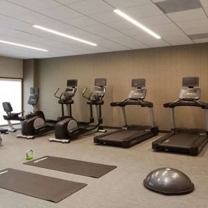 Fitness center with treadmills at Courtyard By Marriott Los Angeles LAX/Century Boulevard.