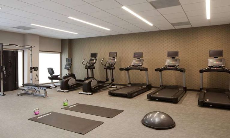 Fitness center with treadmills at Courtyard By Marriott Los Angeles LAX/Century Boulevard.