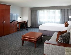 Hotel room with workstation at Courtyard By Marriott Los Angeles LAX/Century Boulevard.