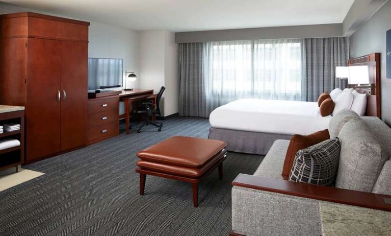 Hotel room with workstation at Courtyard By Marriott Los Angeles LAX/Century Boulevard.