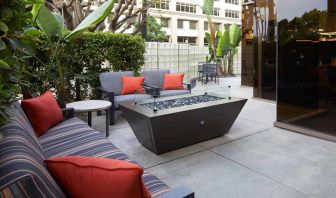 Outdoor patio suitable as workspace at Courtyard By Marriott Los Angeles LAX/Century Boulevard.