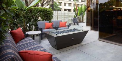 Outdoor patio suitable as workspace at Courtyard By Marriott Los Angeles LAX/Century Boulevard.