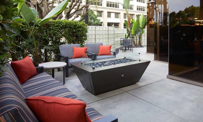 Outdoor patio suitable as workspace at Courtyard By Marriott Los Angeles LAX/Century Boulevard.