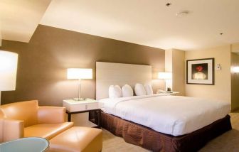 Comfortable king bedroom at Hilton Los Angeles Airport.