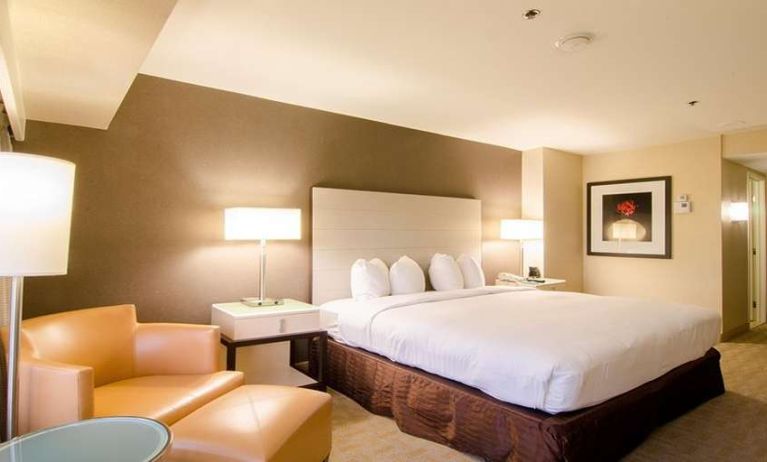 Comfortable king bedroom at Hilton Los Angeles Airport.