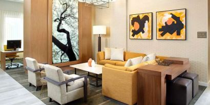 Lobby workspace suitable for co-working at Hyatt Place Miami Airport East.