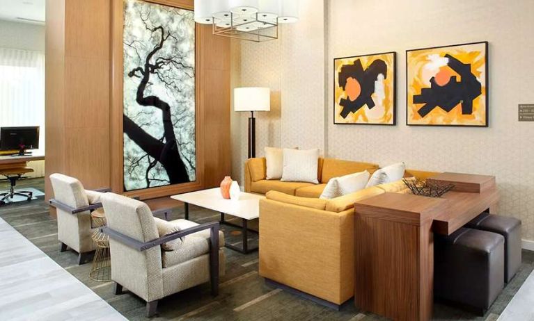 Lobby workspace suitable for co-working at Hyatt Place Miami Airport East.