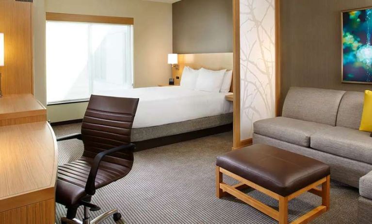 King bedroom room with workstation at Hyatt Place Miami Airport East.