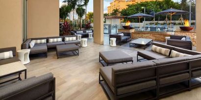 Outdoor patio perfect as workspace at Hyatt Place Miami Airport East.