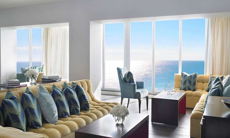 Beautiful living room with sea view perfect as workspace at Shelborne South Beach.