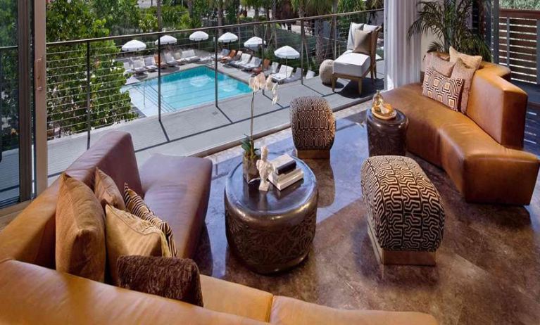 Beautiful living room overlooking the pool area at SLS South Beach.