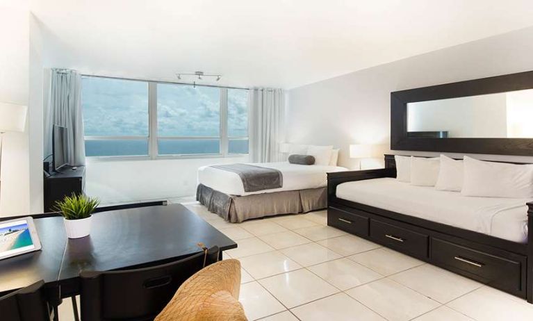 Queen room with workstation at New Point Miami.