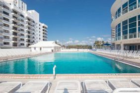 Relaxing outdoor pool at New Point Miami.