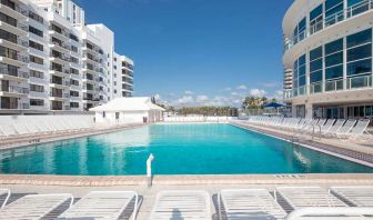 Relaxing outdoor pool at New Point Miami.