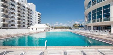 Relaxing outdoor pool at New Point Miami.