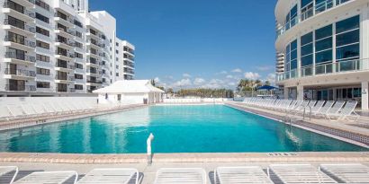 Relaxing outdoor pool at New Point Miami.