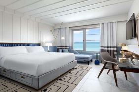 King bedroom with workstation at Cadillac Hotel & Beach Club, Autograph Collection.