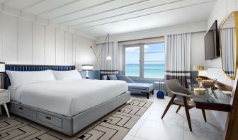 King bedroom with workstation at Cadillac Hotel & Beach Club, Autograph Collection.