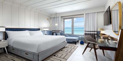 King bedroom with workstation at Cadillac Hotel & Beach Club, Autograph Collection.