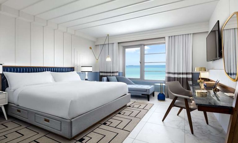 King bedroom with workstation at Cadillac Hotel & Beach Club, Autograph Collection.