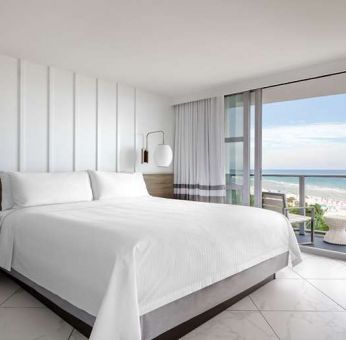 Hotel room with window and sea view at Cadillac Hotel & Beach Club, Autograph Collection.