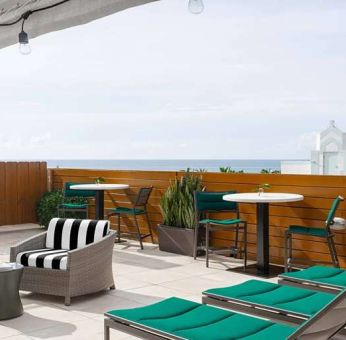 Beautiful outdoor terrace suitable as workspace at Winter Haven, Autograph Collection.