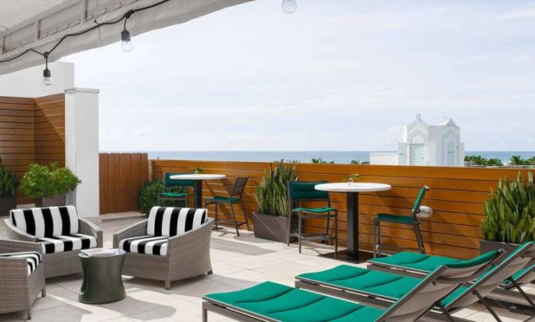 Beautiful outdoor terrace suitable as workspace at Winter Haven, Autograph Collection.