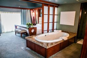 King bedroom with bathtub at Shade Hotel Manhattan Beach.