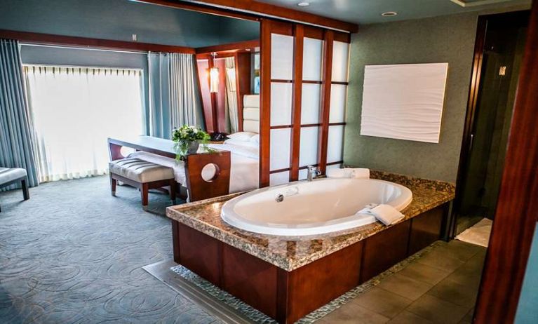 King bedroom with bathtub at Shade Hotel Manhattan Beach.