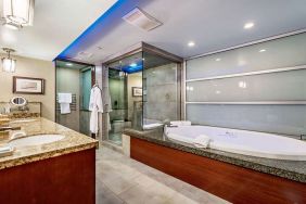 Guest bathroom with bathtub at Shade Hotel Manhattan Beach.