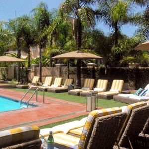 Pool area with lounges at Hollywood Hotel.