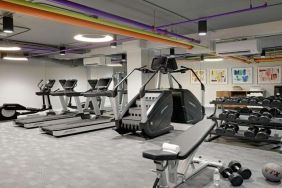 Fitness center with weights at Le Parc.