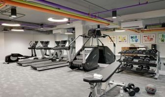 Fitness center with weights at Le Parc.