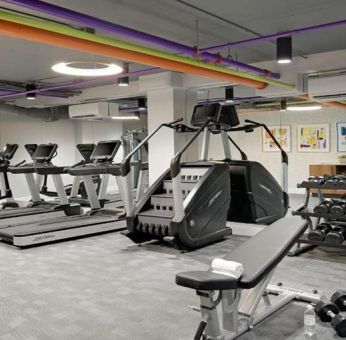 Fitness center with weights at Le Parc.