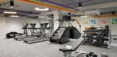 Fitness center with weights at Le Parc.