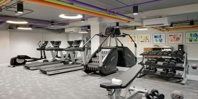 Fitness center with weights at Le Parc.