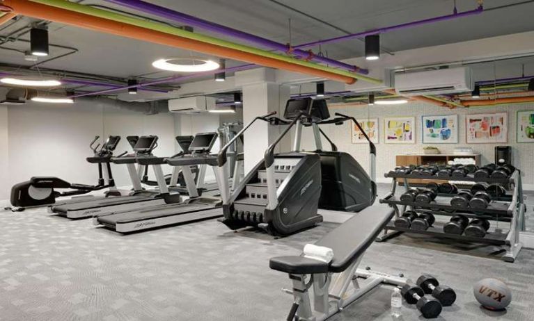 Fitness center with weights at Le Parc.