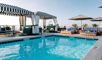 Pool area with lounges at Le Montrose.